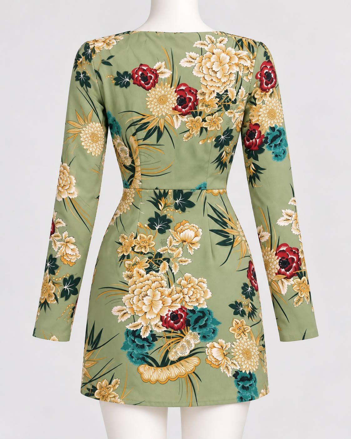 Back view of the PrettyLittleThing sage green floral mini dress with long sleeves and a defined waist